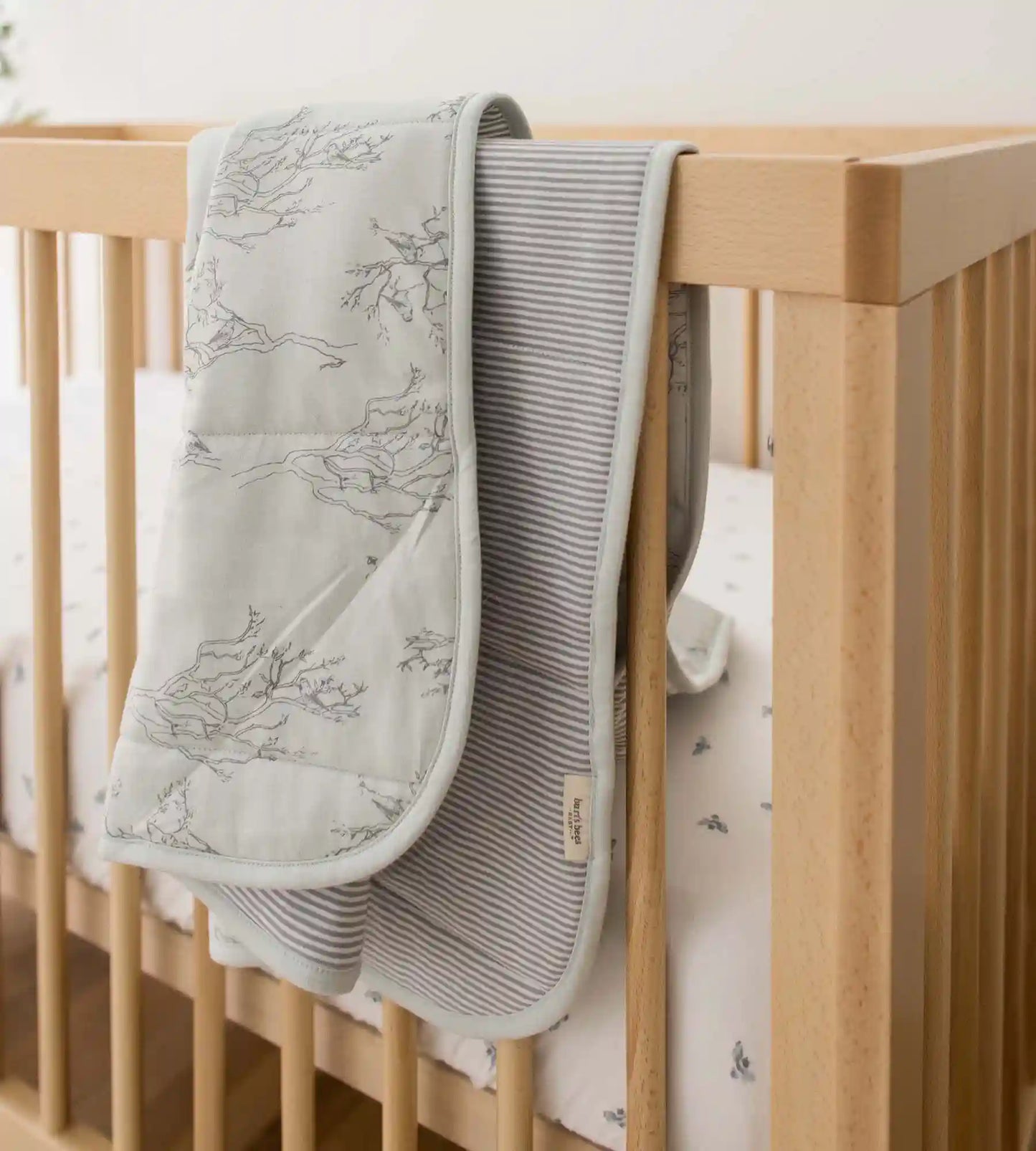 Swaying Branches Organic Cotton Reversible Baby Blanket - Ice Flow